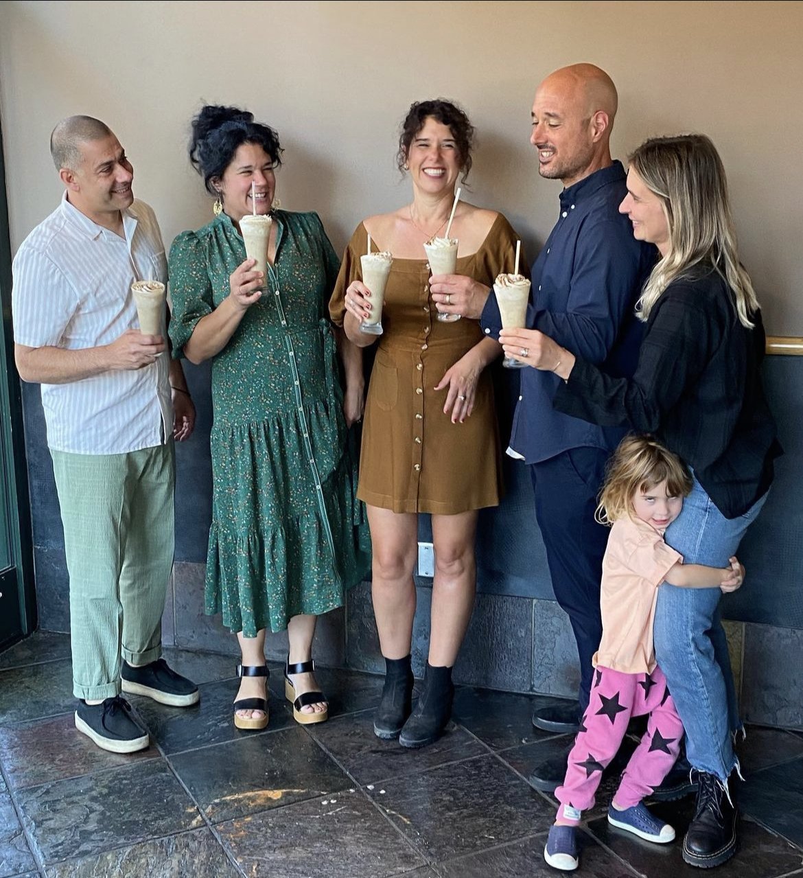 The Borrone family sharing milkshakes
