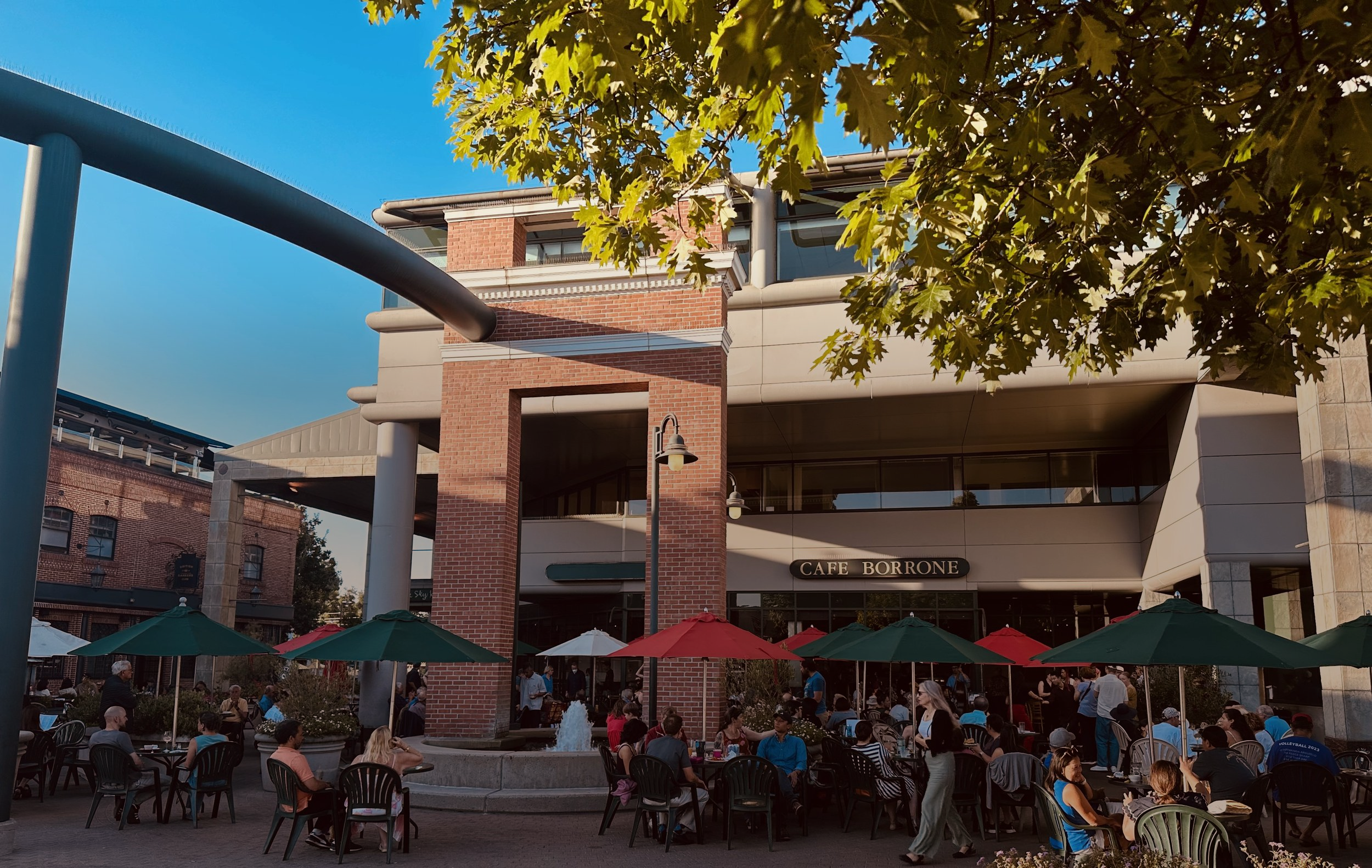 Cafe Borrone patio and the brick fountain arch in downtown Menlo Park