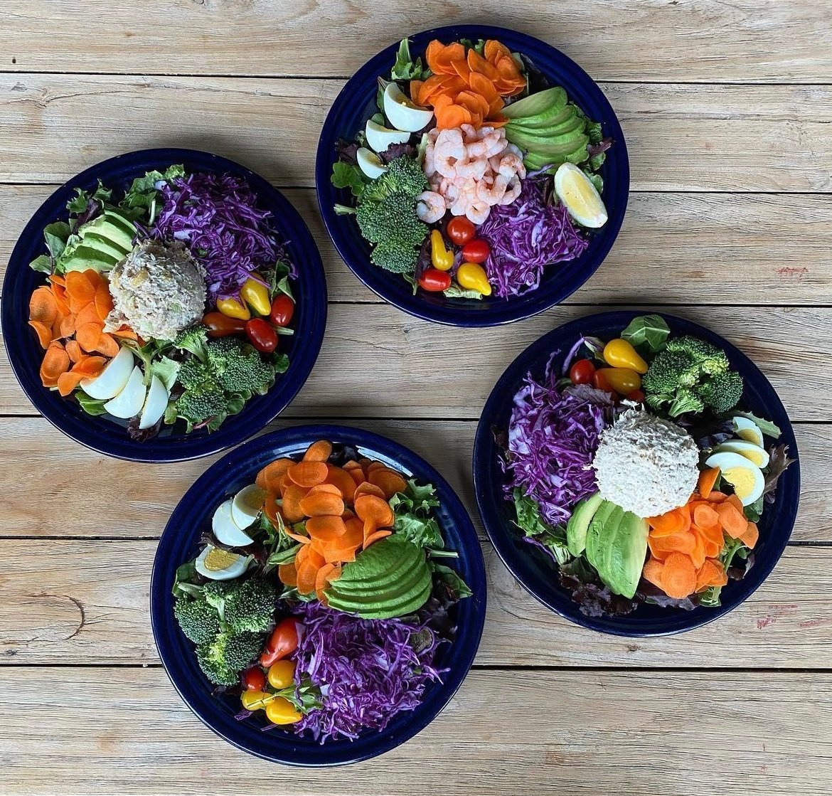 Overhead view of composed salads
